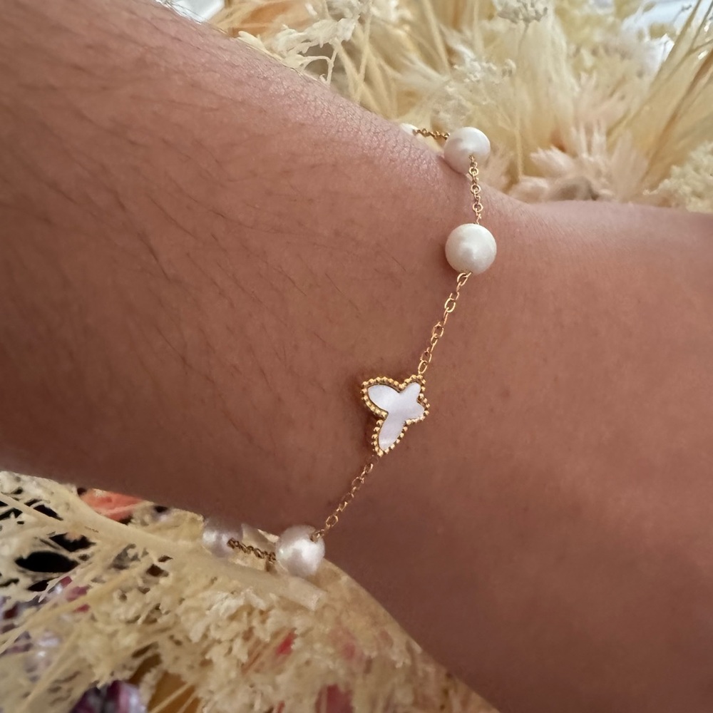 Brand new gold plated pearl and mother of pearl butterfly bracelet